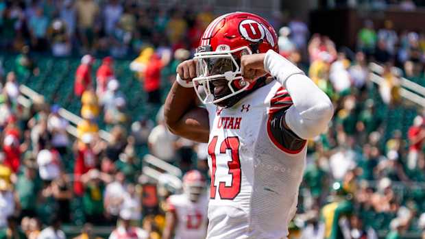 Sep 9, 2023; Waco, Texas, USA; Utah Utes quarterback Nate Johnson (13) carries the ball for a 11-yard touchdown against the Baylor Bears during the second half at McLane Stadium. Mandatory Credit: Raymond Carlin III-USA TODAY Sports